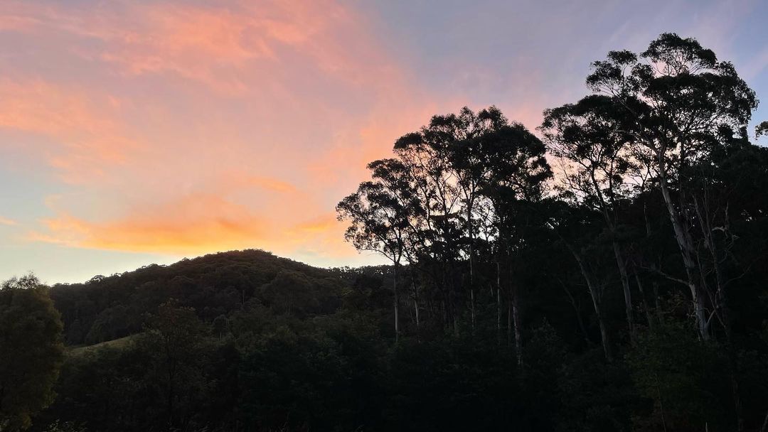 The sunset was a beautiful sight to behold. The sky was painted with shades of r
